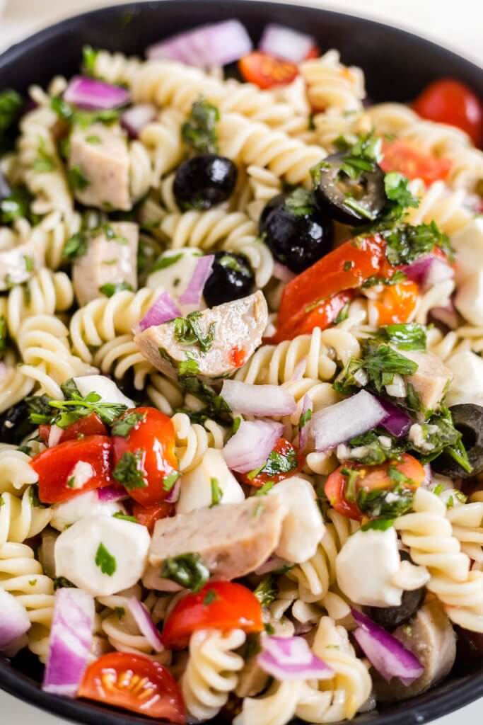 italian pasta salad recipe including pasta, peppers, sausage, mozzarella and italian dressing