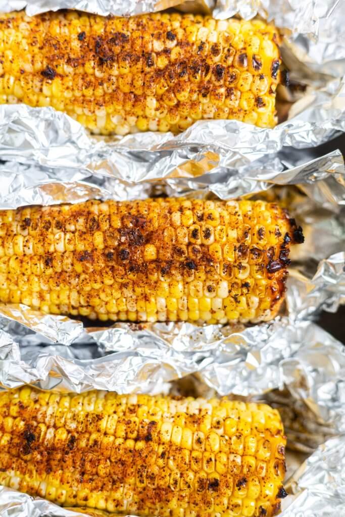 roasted corn with spices in foil