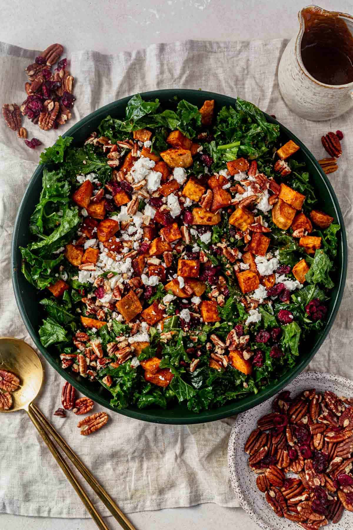 kale and sweet potato salad in a serving bowl.