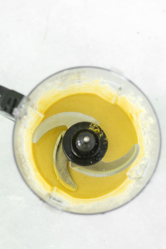 vegan caesar dressing recipe after it's been blended in a food processor
