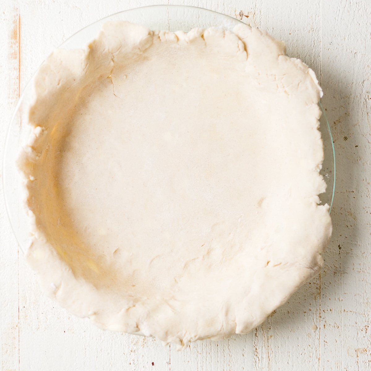 gluten free pie crust inside the glass baking dish
