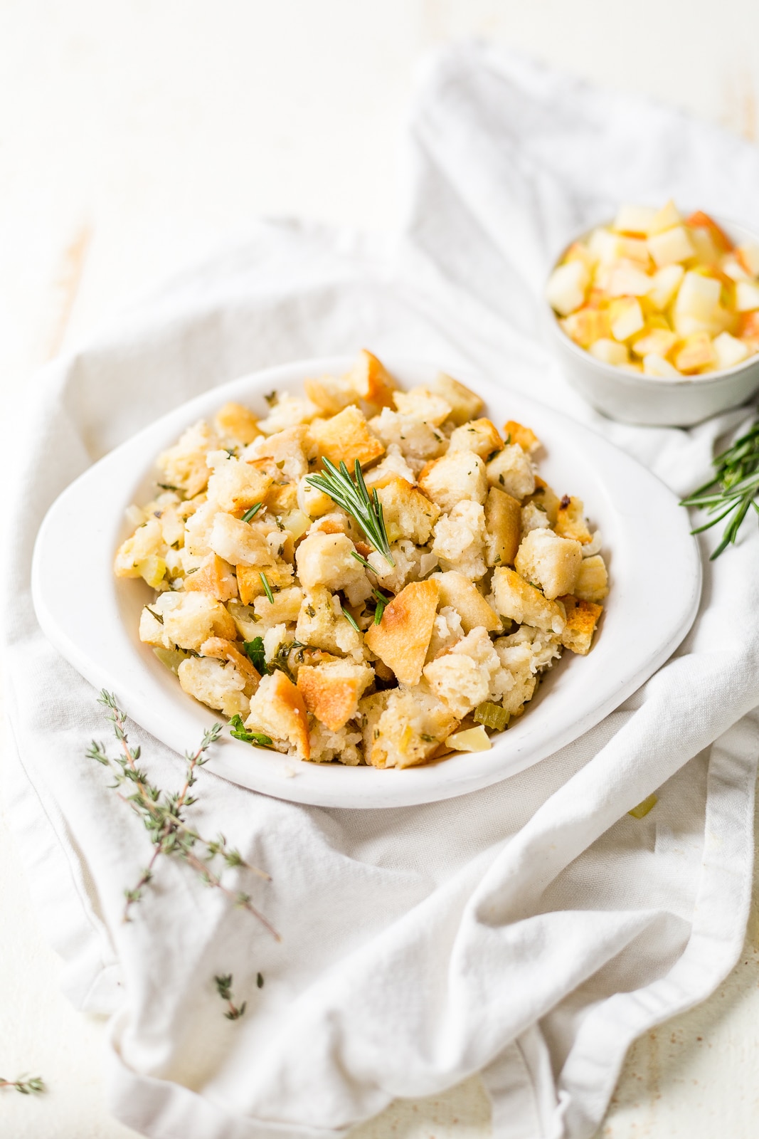 sourdough bread stuffing in a white dish