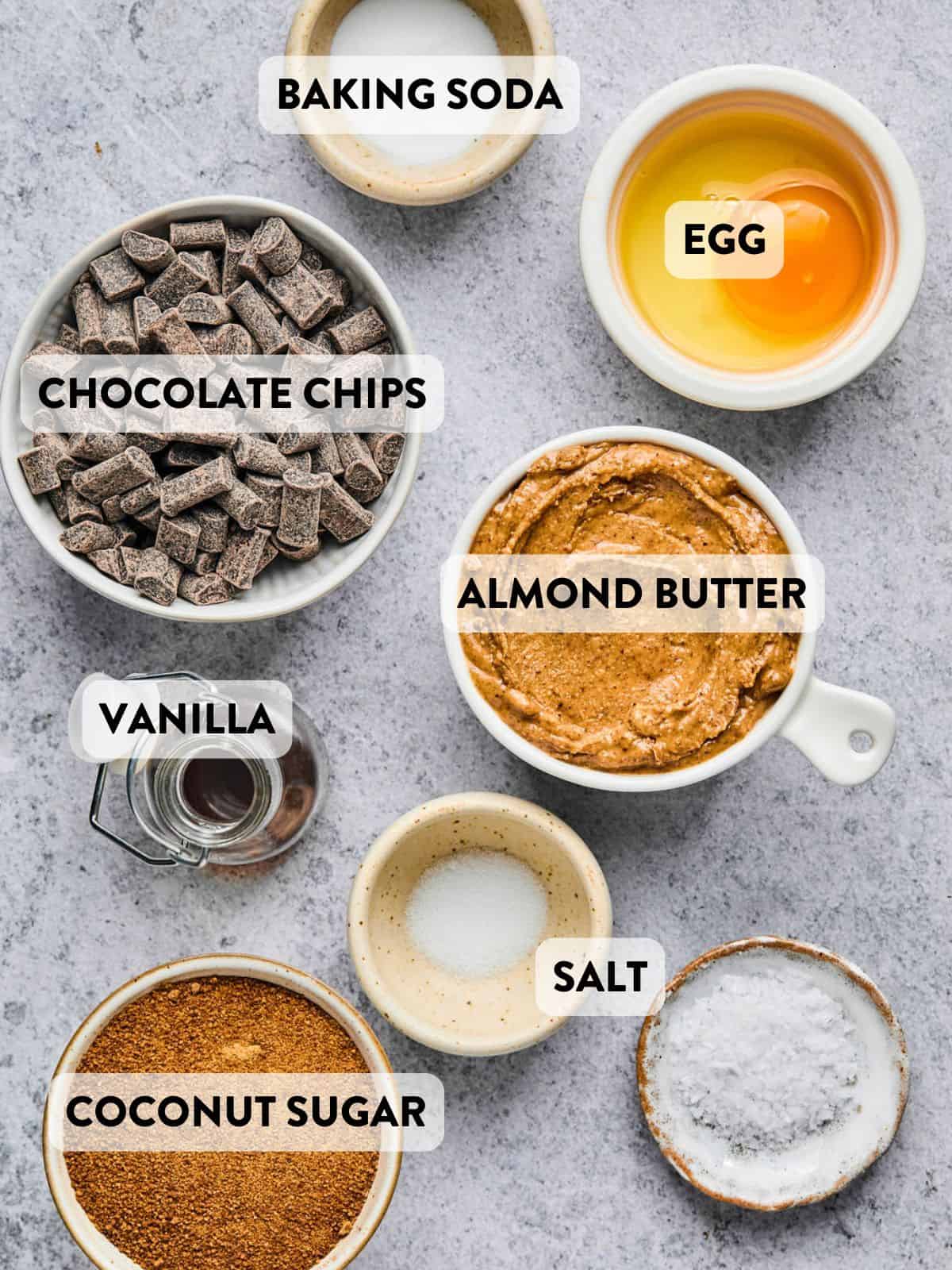 ingredients for almond butter cookies on a counter.