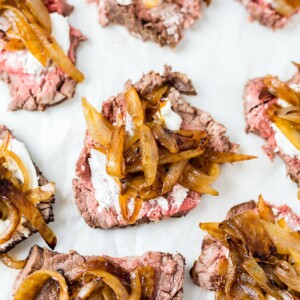 beef tenderloin sliced thinly and topped with goat cheese and caramelized onion