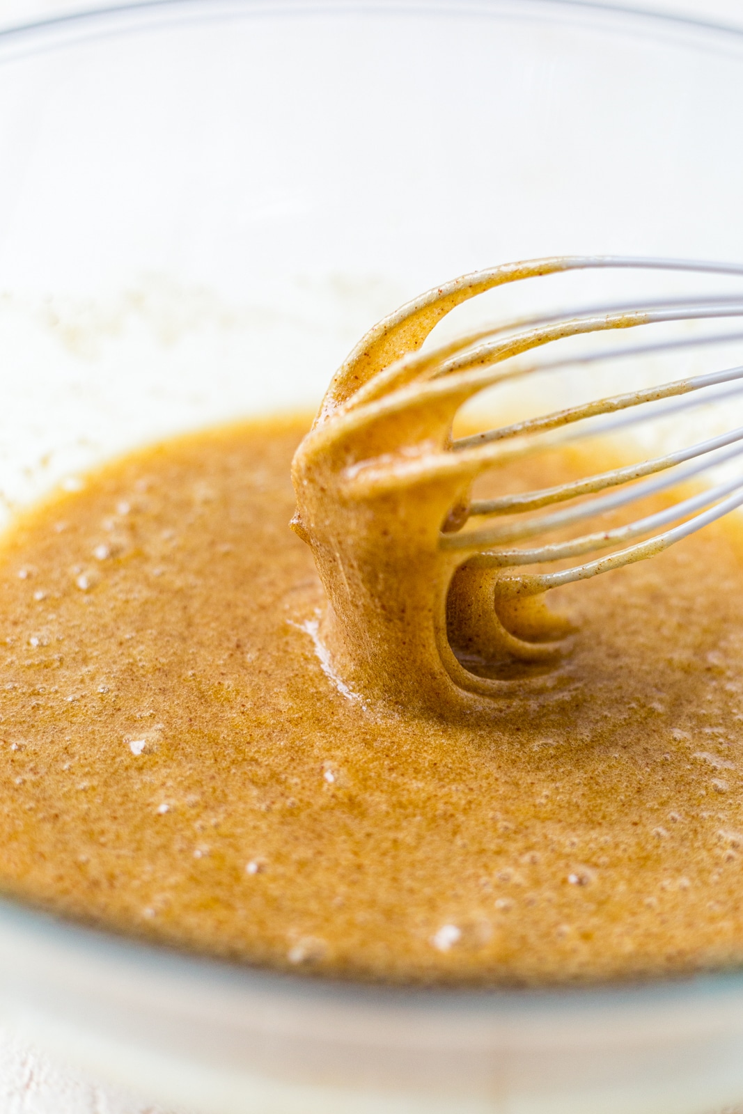 whisk stirring brown butter oatmeal cookie batter