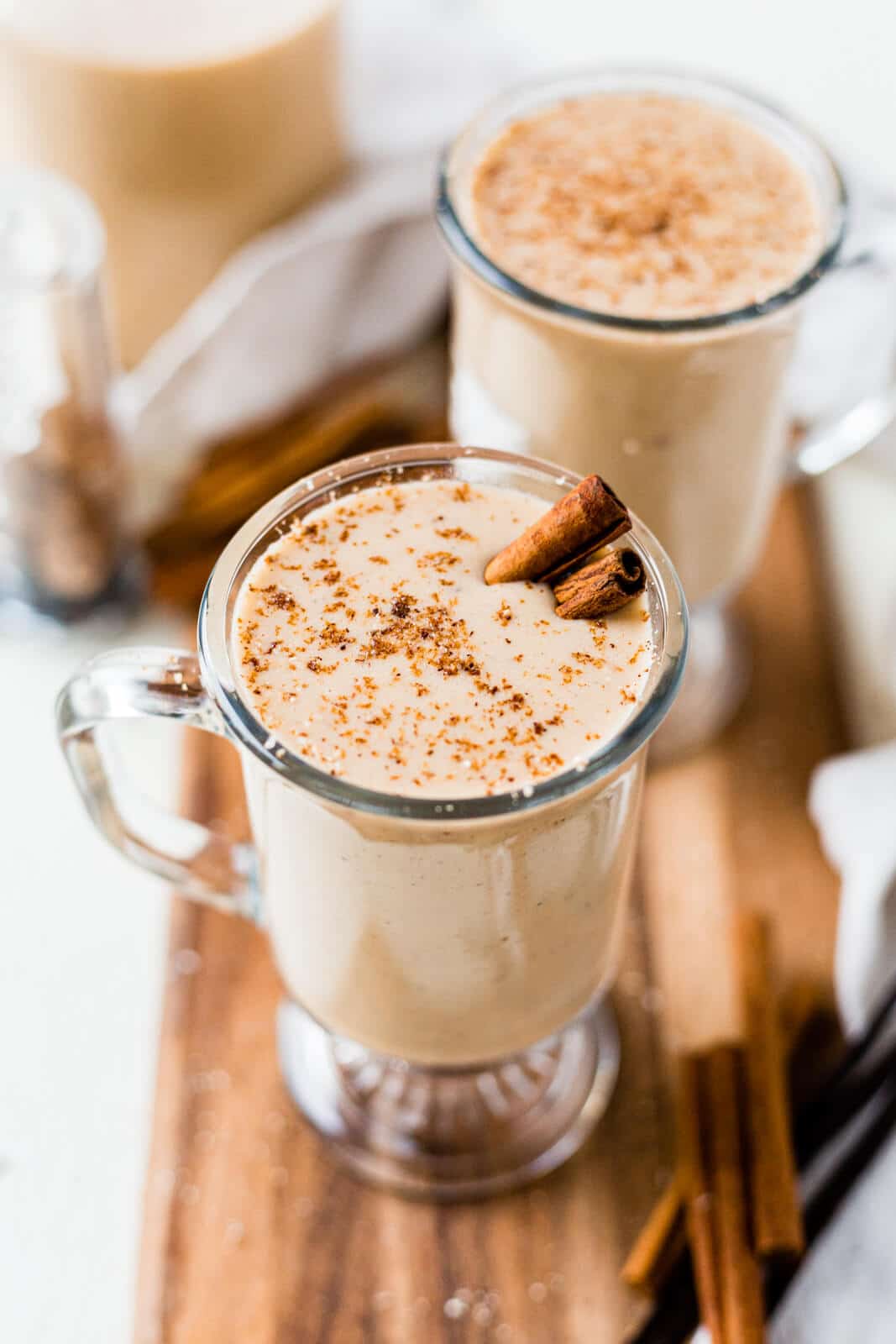 spiced dairy free eggnog recipe topped with fresh nutmeg