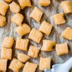 gnocchi laid out on a baking sheet covered in aluminum foil
