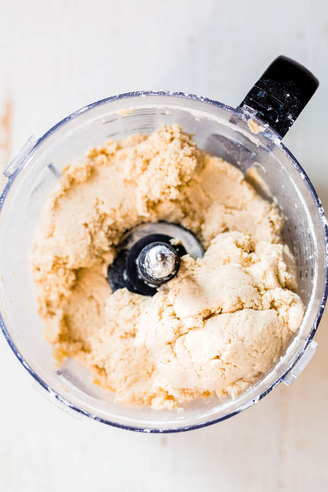 cauliflower gnocchi dough in the bowl of a food processor