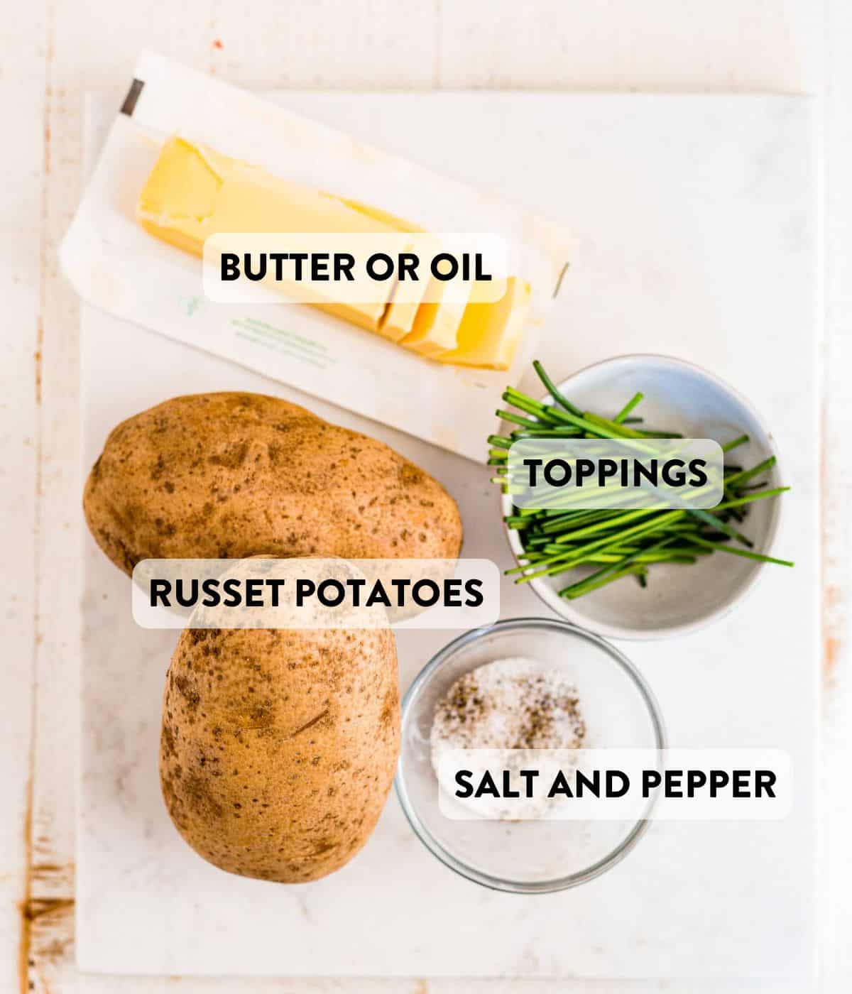 air fryer baked potato ingredients on a counter.