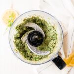 arugula pesto ingredients blended in the food processor