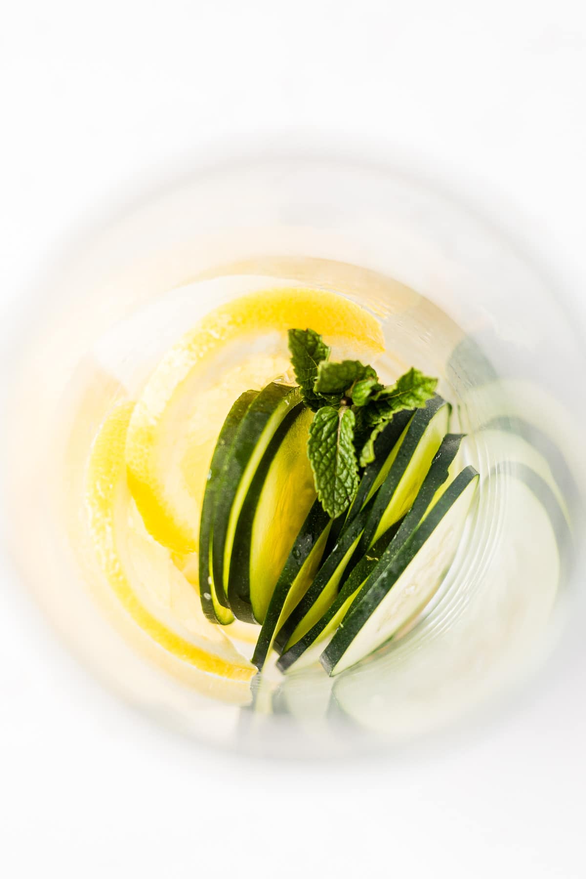 sliced cucumber, lemon and mint in a pitcher