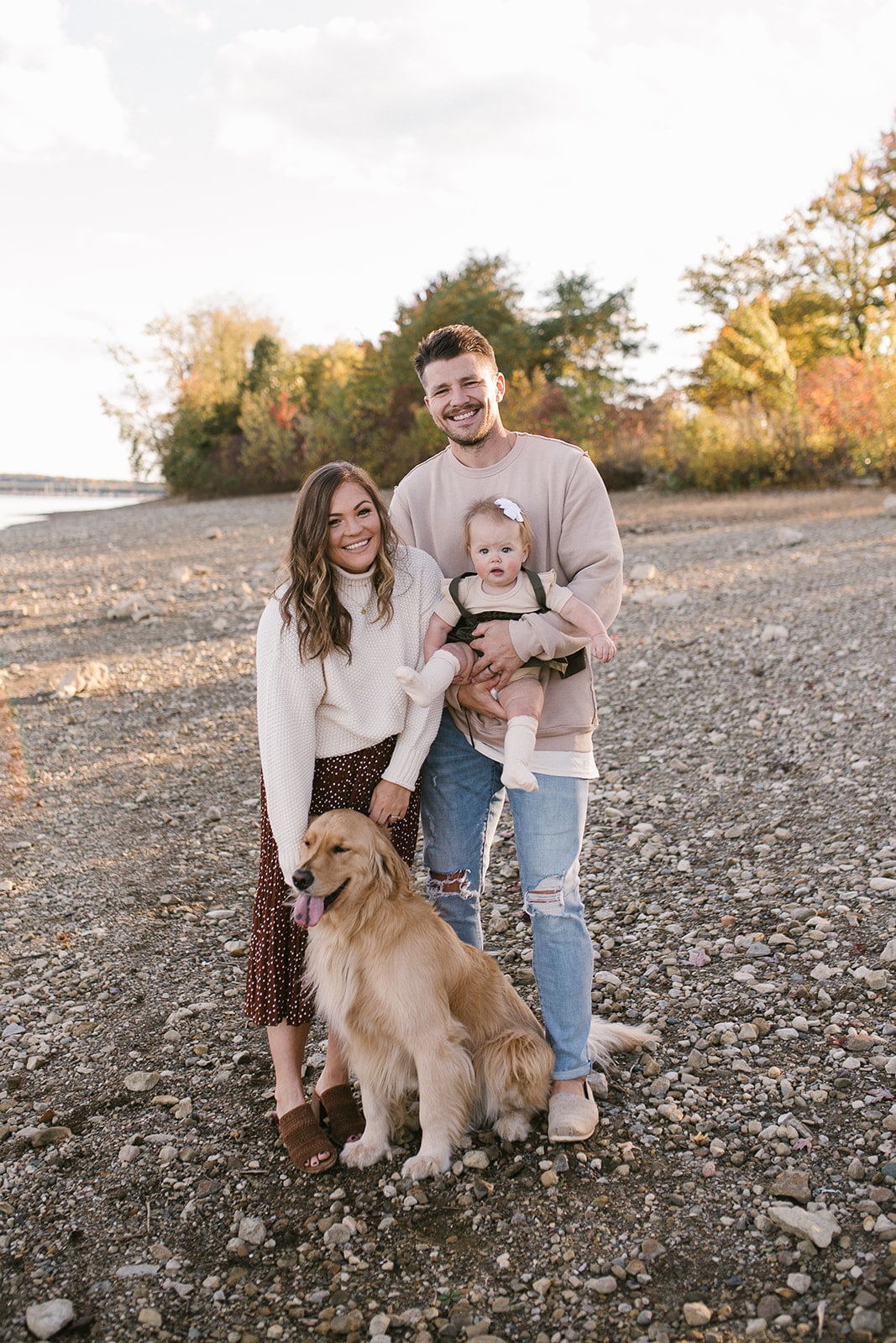 family photo of molly, zach cooper and golden retreiver