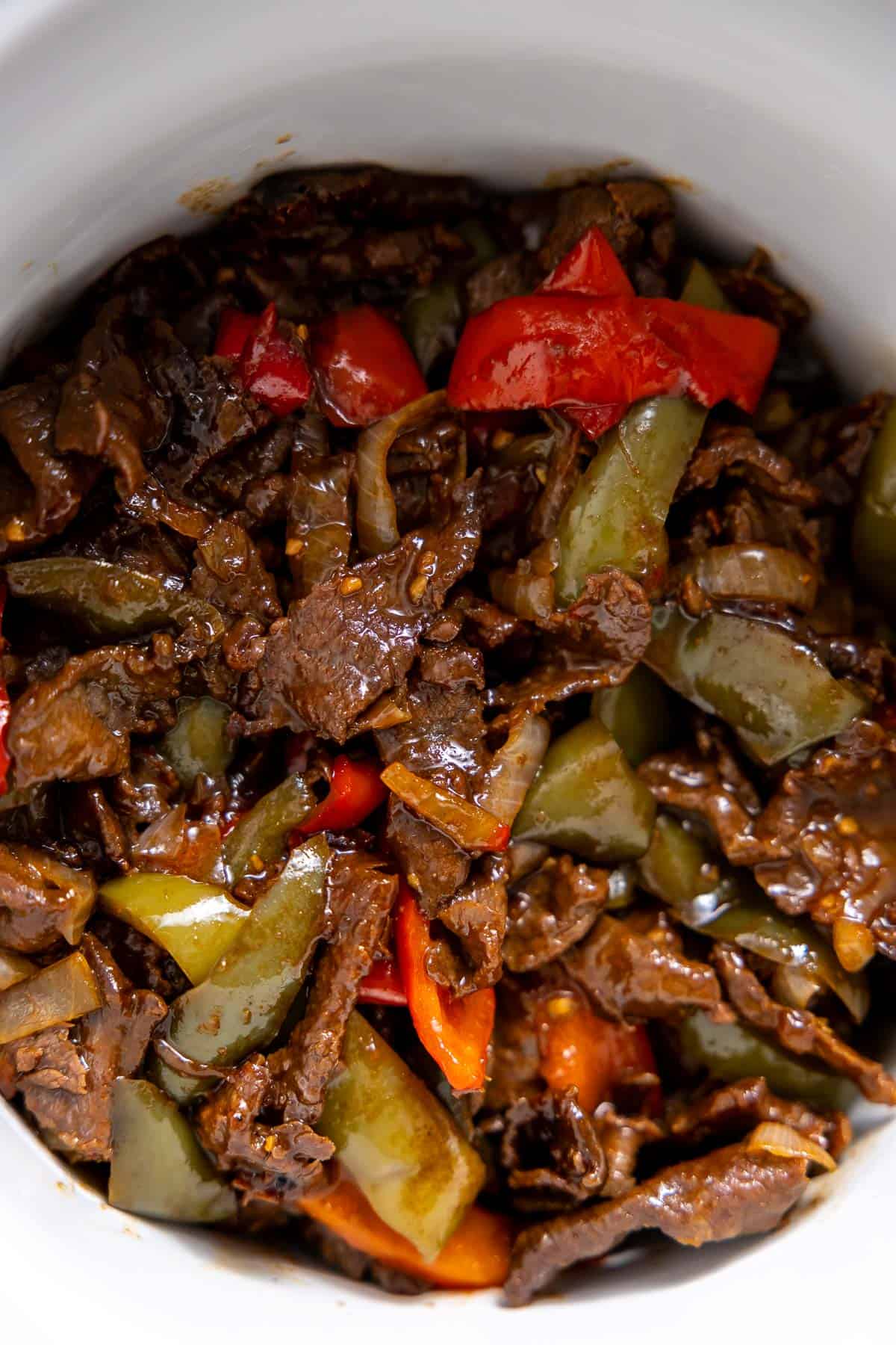 crock pot pepper steak in the slow cooker.