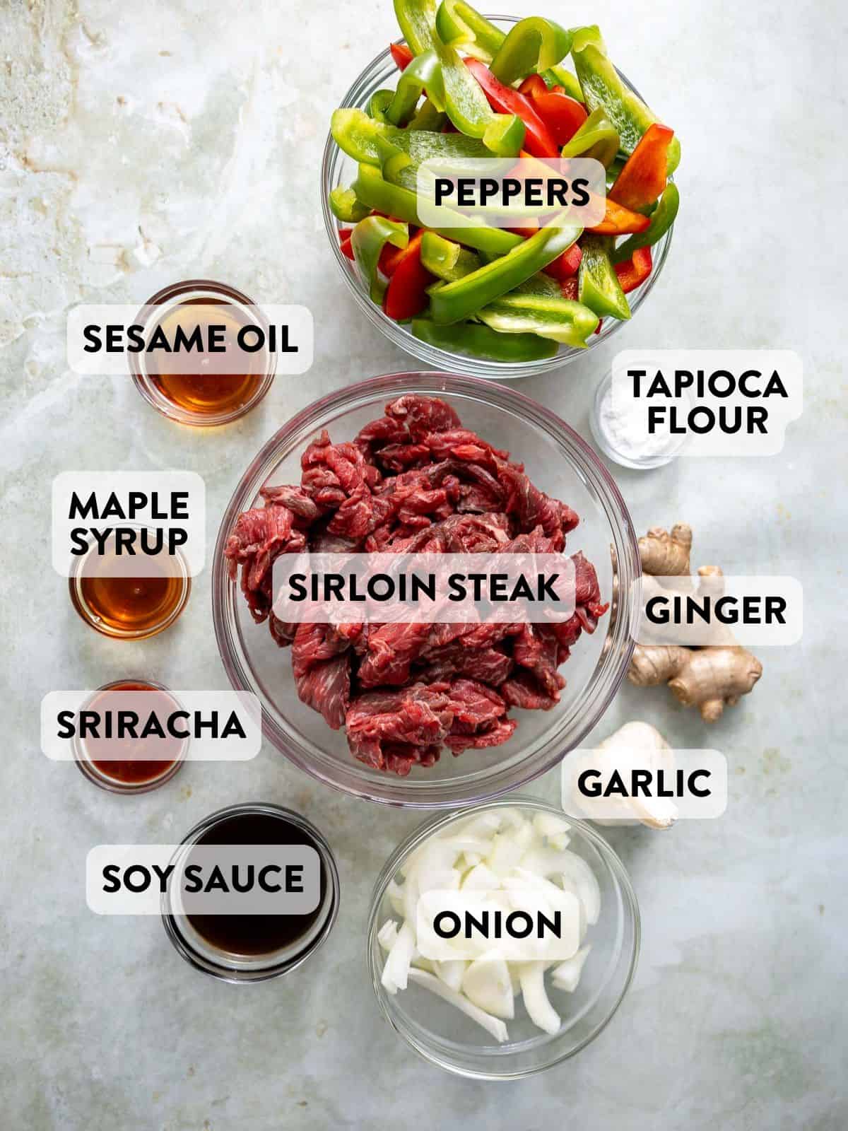 crock pot pepper steak ingredients on a counter.