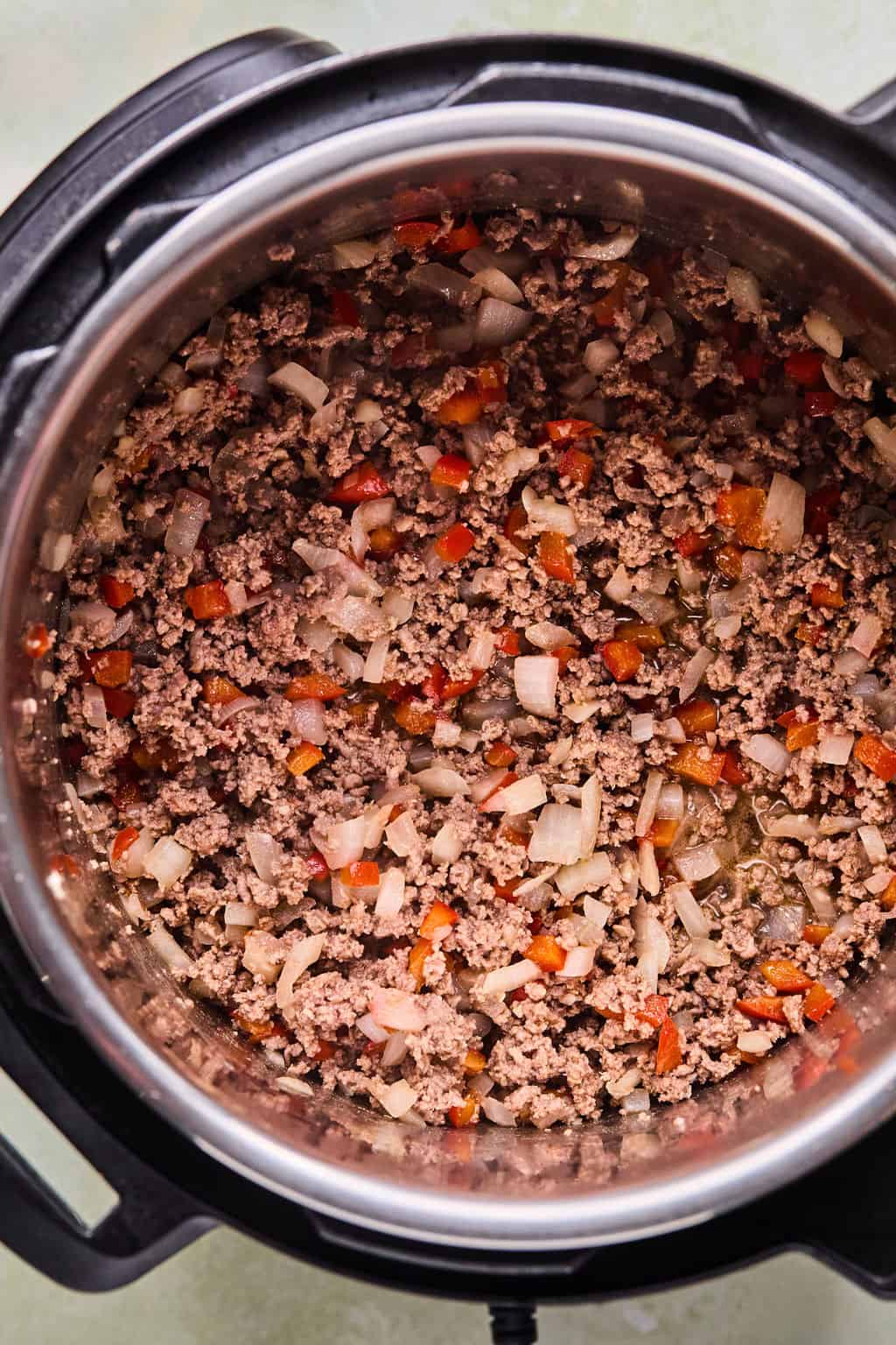 cooked ground beef, onions, and peppers in an Instant Pot.