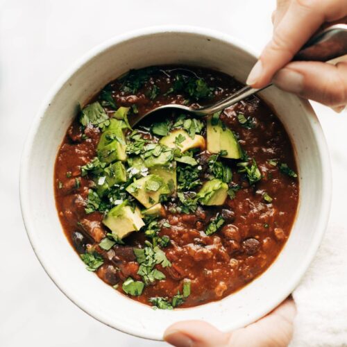 instant pot pumpkin walnut chili in a white bowl