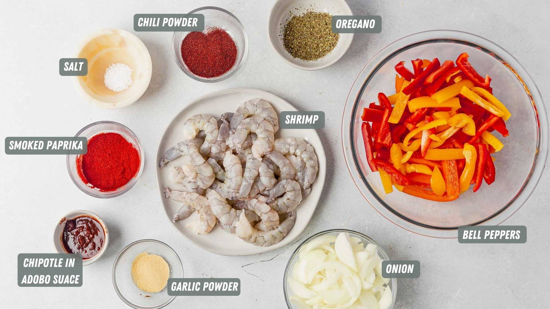 shrimp fajita ingredients measured out on a table