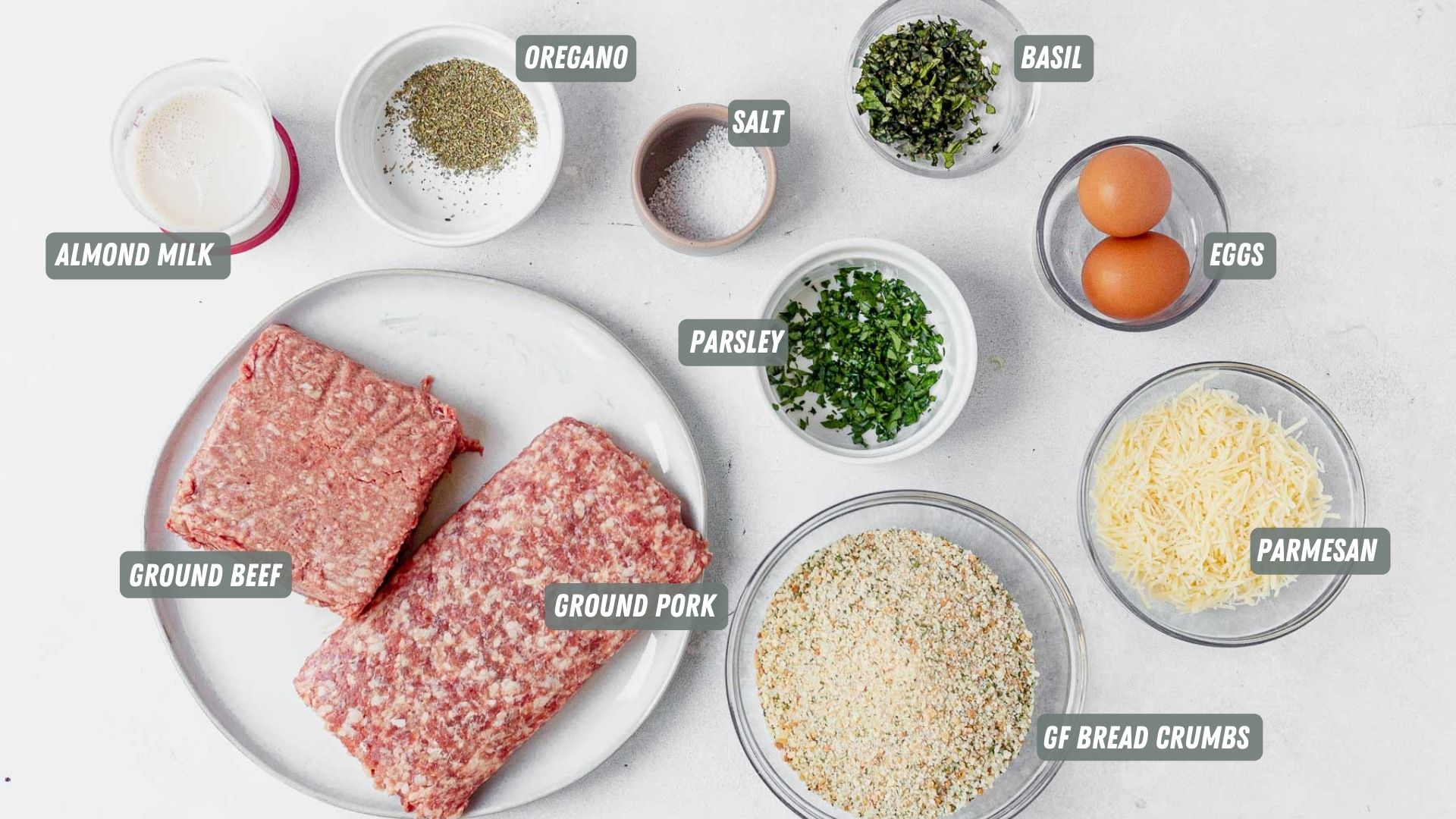 ingredients for gluten free meatballs measured out on a table