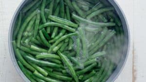 green beans blanching in a pot