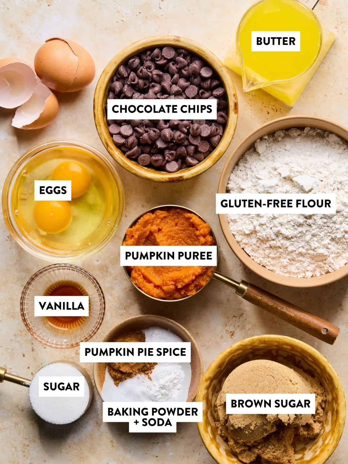 labeled ingredients for gluten free pumpkin muffins on a counter.