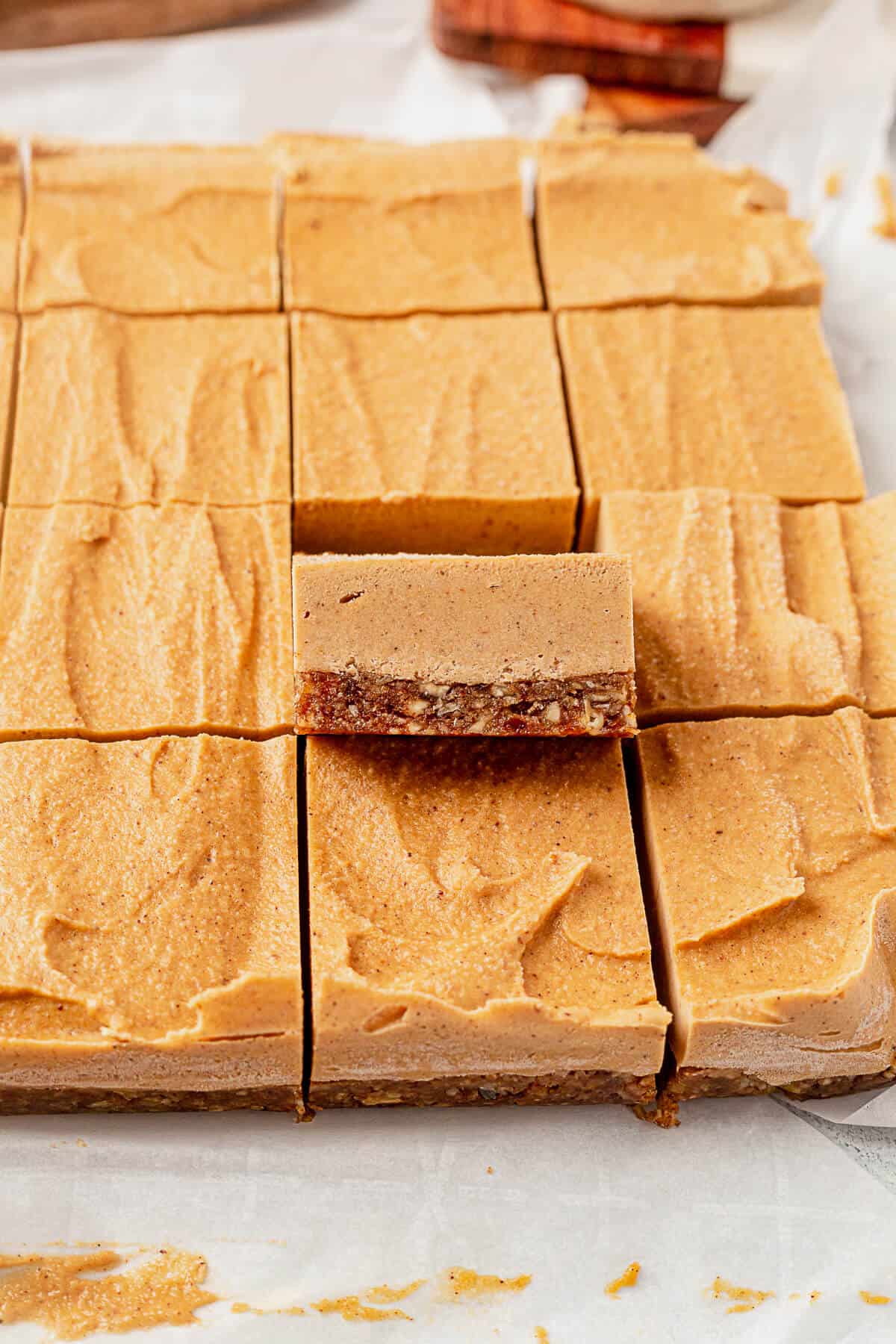 vegan pumpkin cheesecake cut into slices