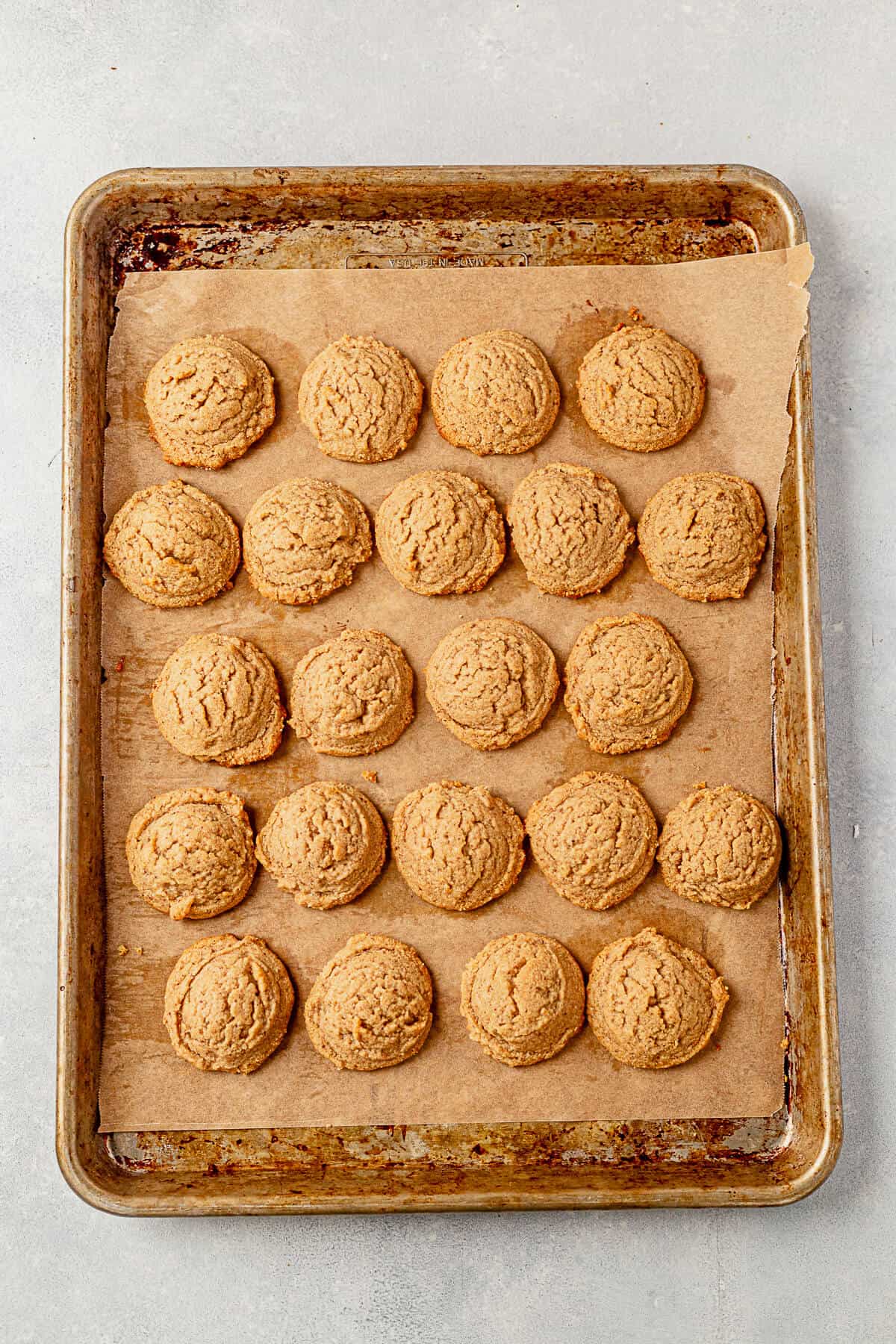 5 rows of almond flour peanut butter cookies on a cookie sheet