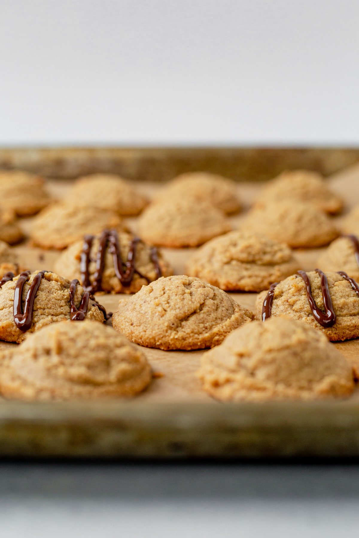 healthy almond flour peanut butter cookies on a baking sheet