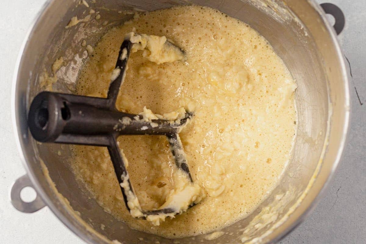 wet ingredients for italian sprinkle cookies in a mixing bowl