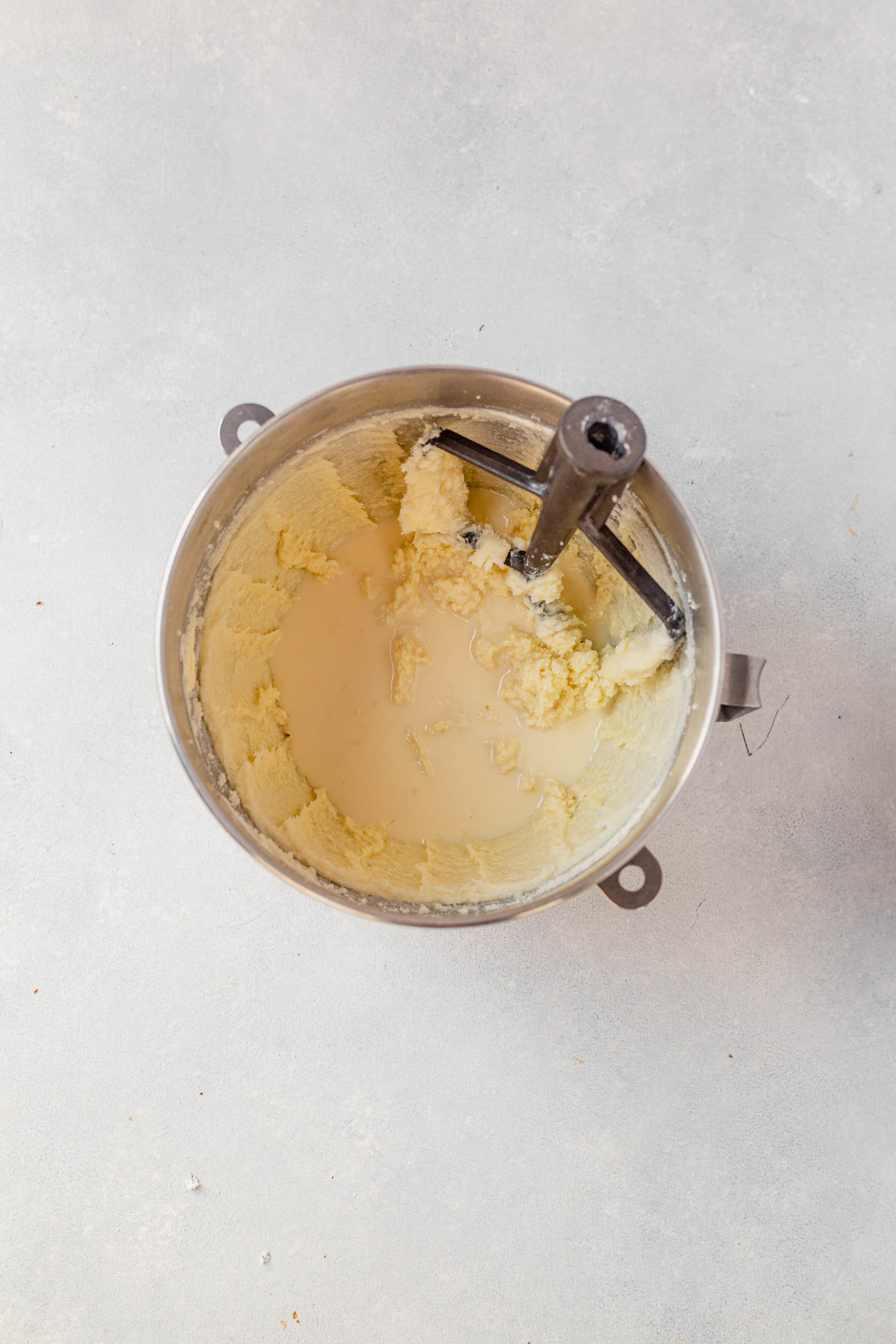 eggnog cookie dough wet ingredients with eggnog poured on top
