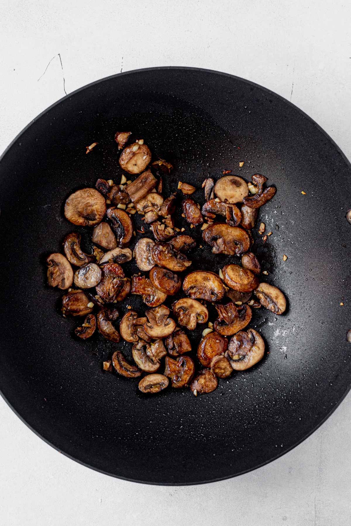 caramelized mushrooms cooked in a wok