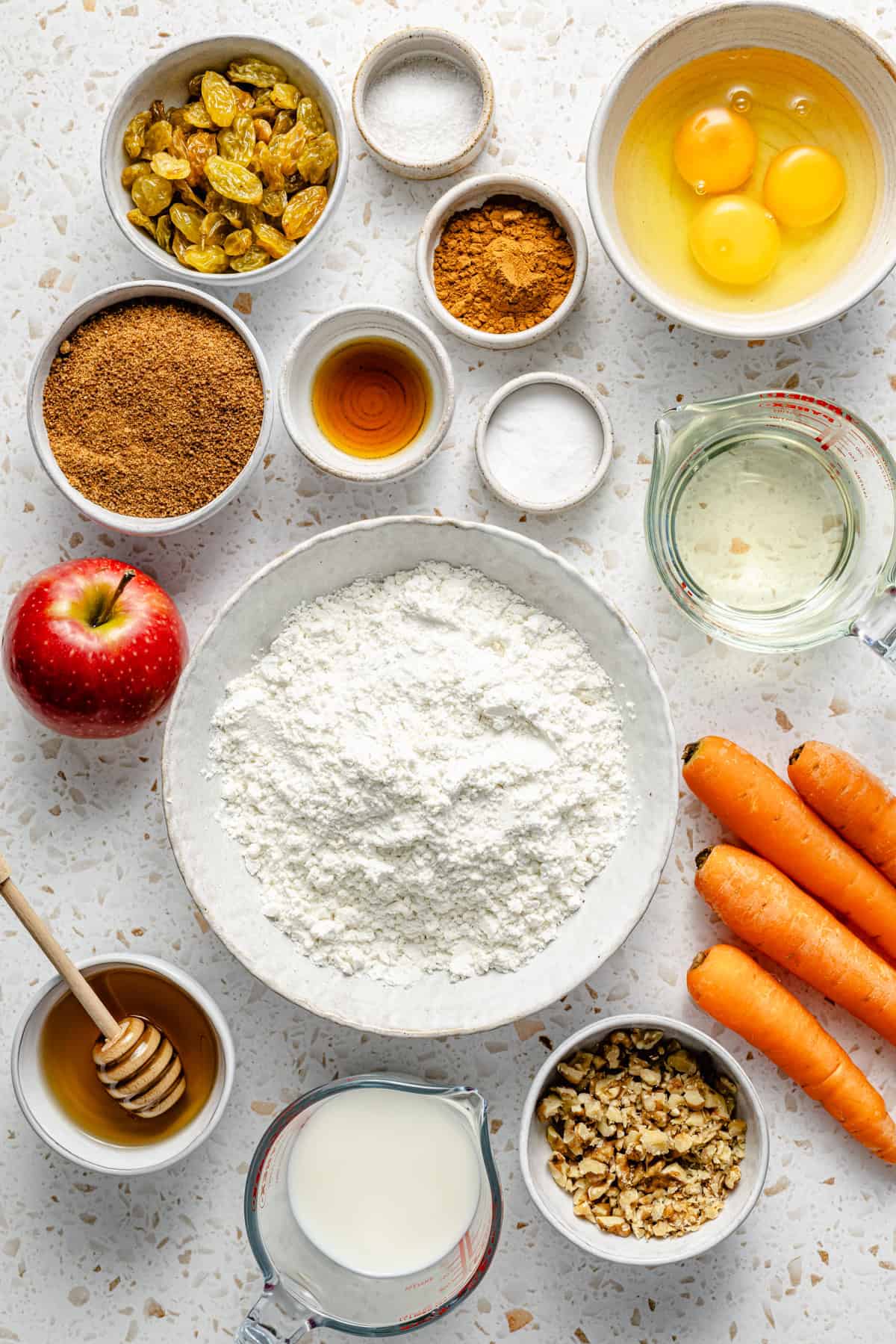 ingredients for gluten free morning glory muffins on a counter.