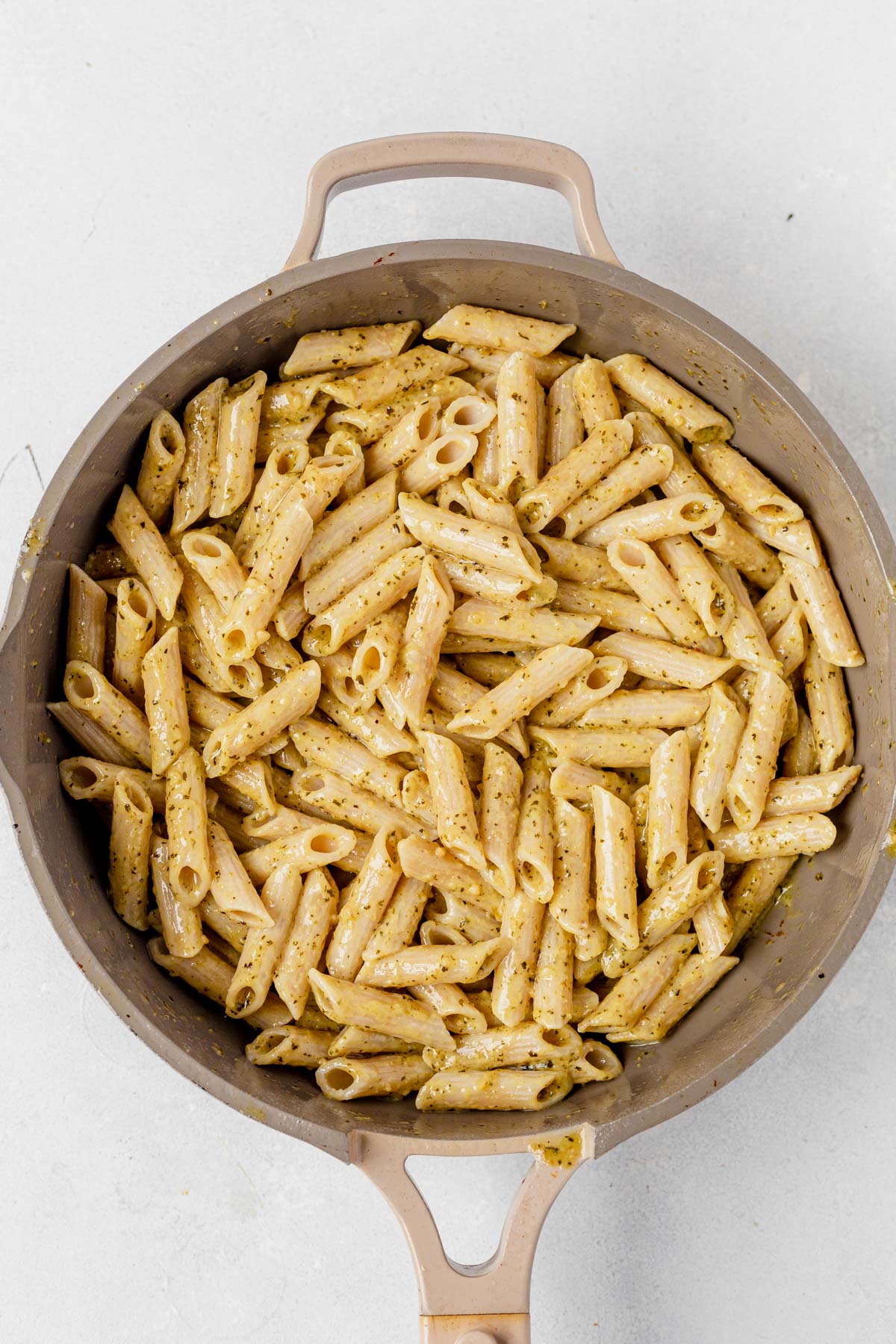 a pot of penne pasta in a saucepan