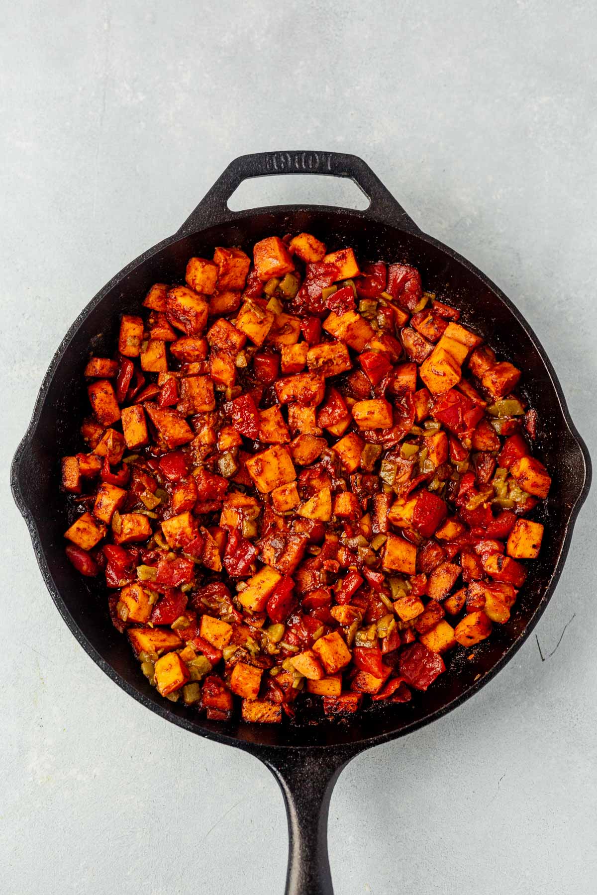 tomatoes and sweet potatoes in a  taco skillet