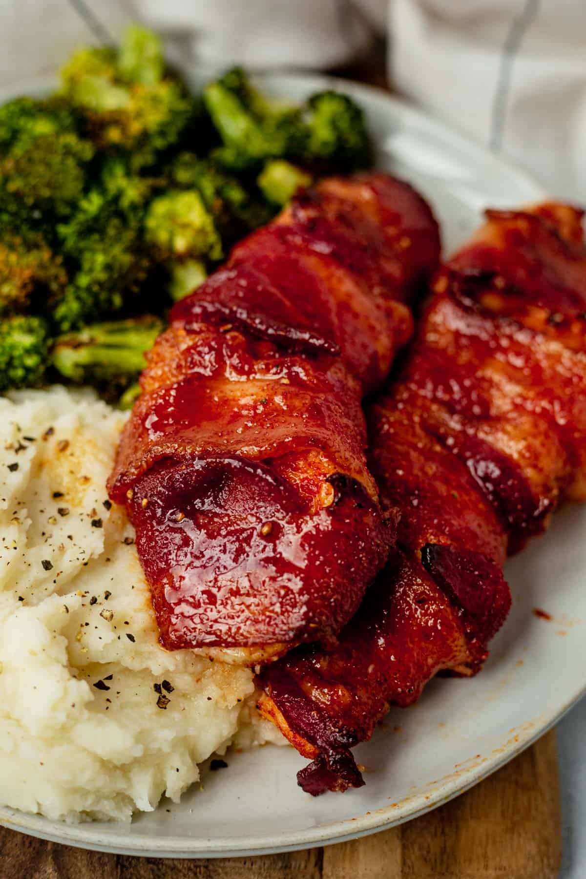 crispy bacon wrapped around chicken breast