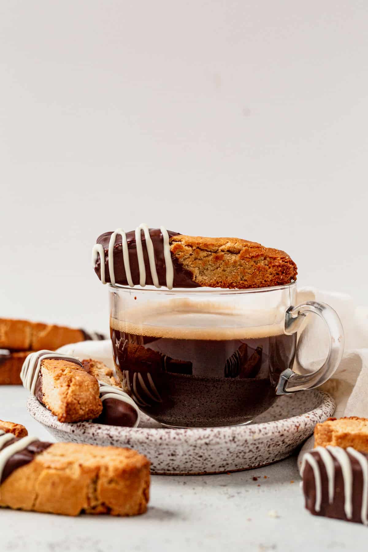 gluten free biscotti on top of a cup of coffee