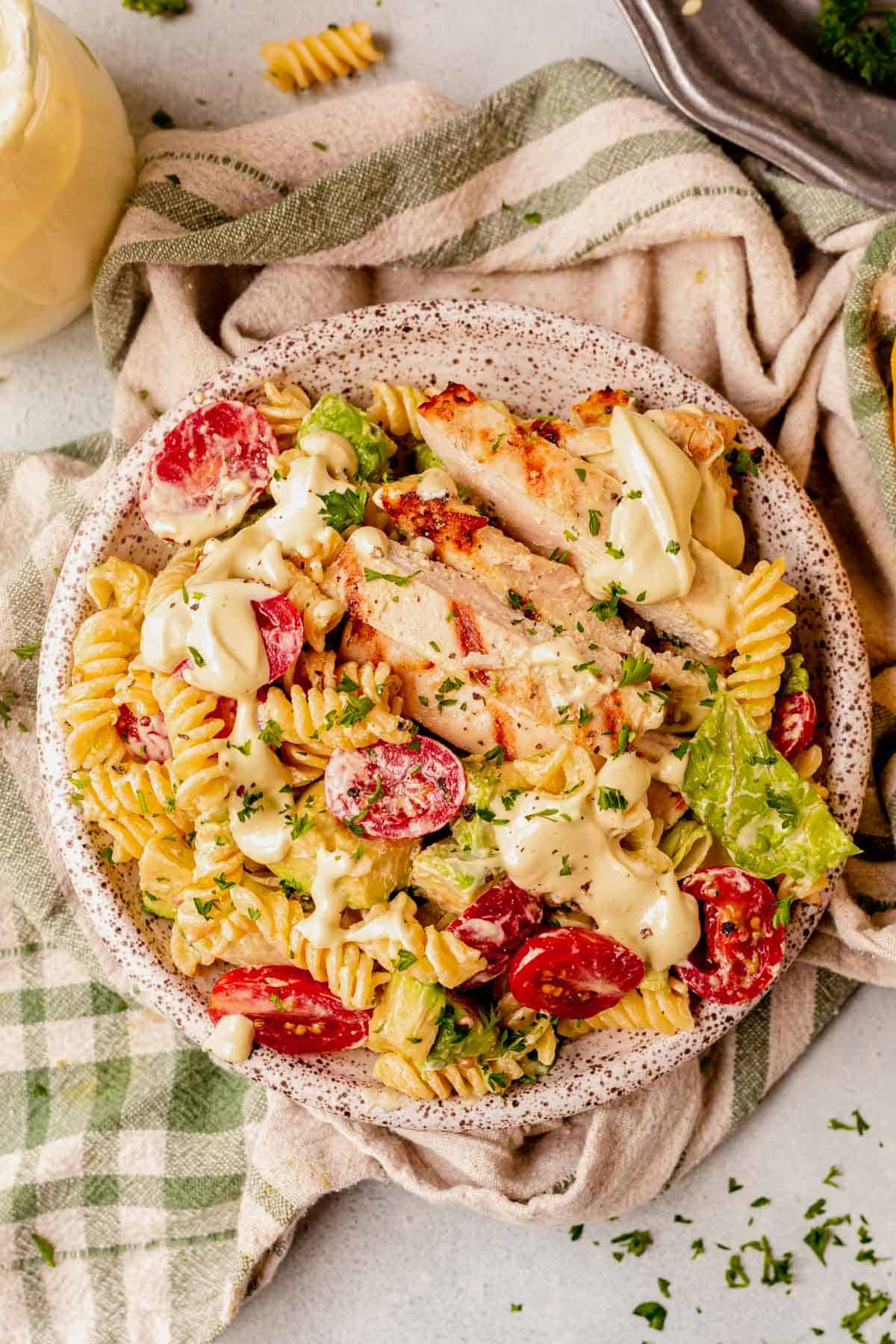 chicken caesar pasta salad on a plate