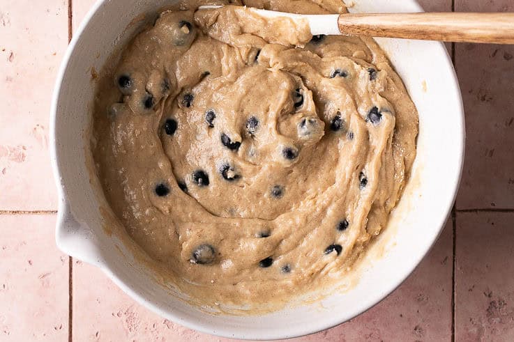 blueberry muffin batter in a mixing bowl