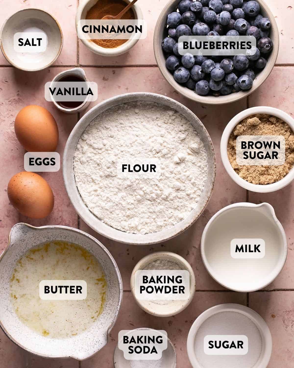 ingredients for blueberry crumb muffins on a countertop