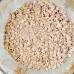 oats, flour, cinnamon and butter in a bowl for crisp