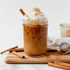 copycat iced cinnamon dolce latte recipe in a glass cup