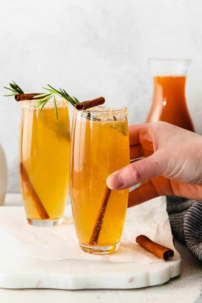 apple cider mimosa on a serving tray