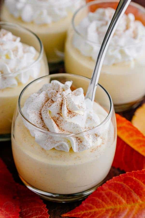pumpkin mousse in a cup with whipped cream