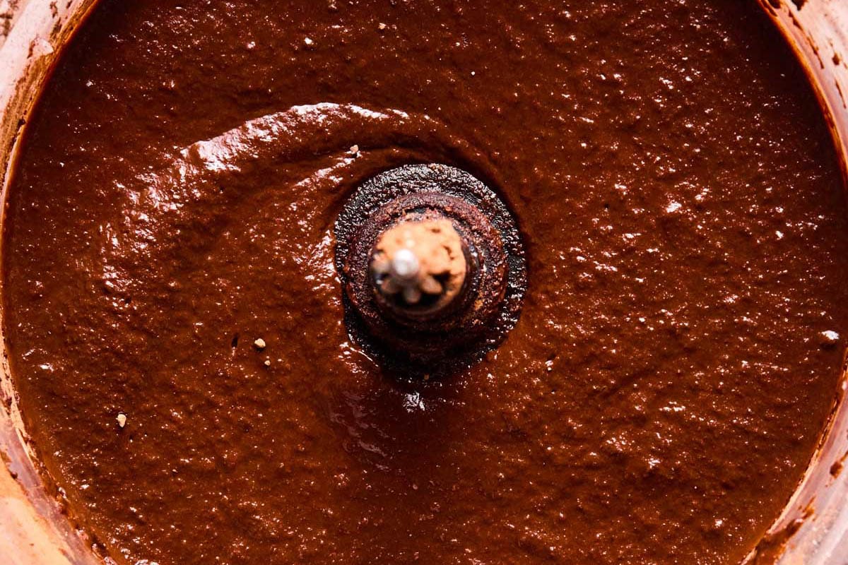 blended chocolate potato cake batter in a food processor.