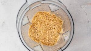 nutritional yeast and raw cashews crushed in a blender