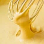 whisking vegan cheese sauce