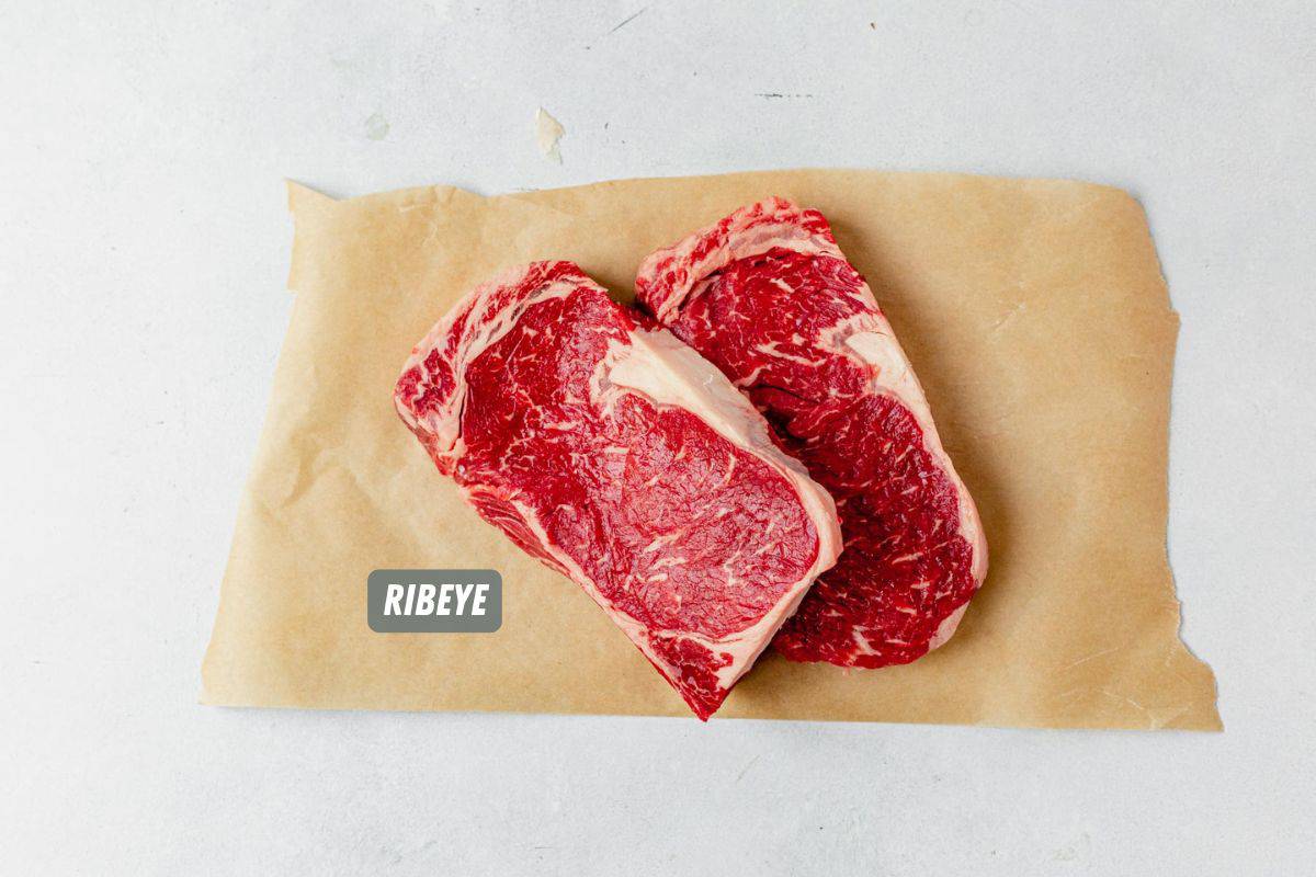 two ribeye steaks on butcher paper