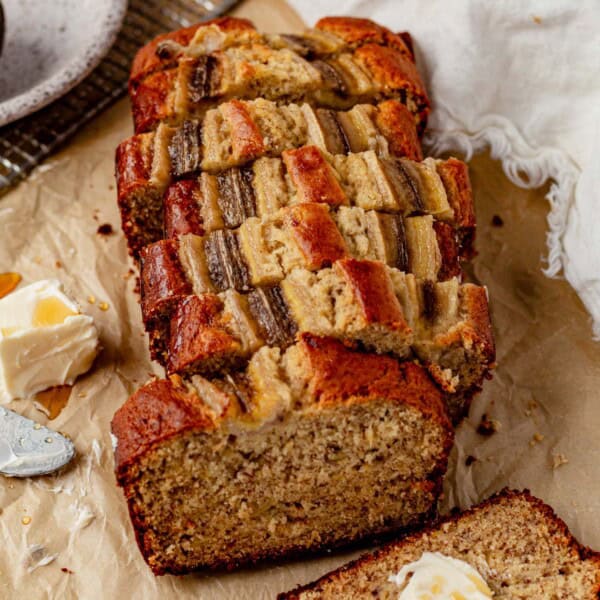 a sliced loaf of brown butter banana bread