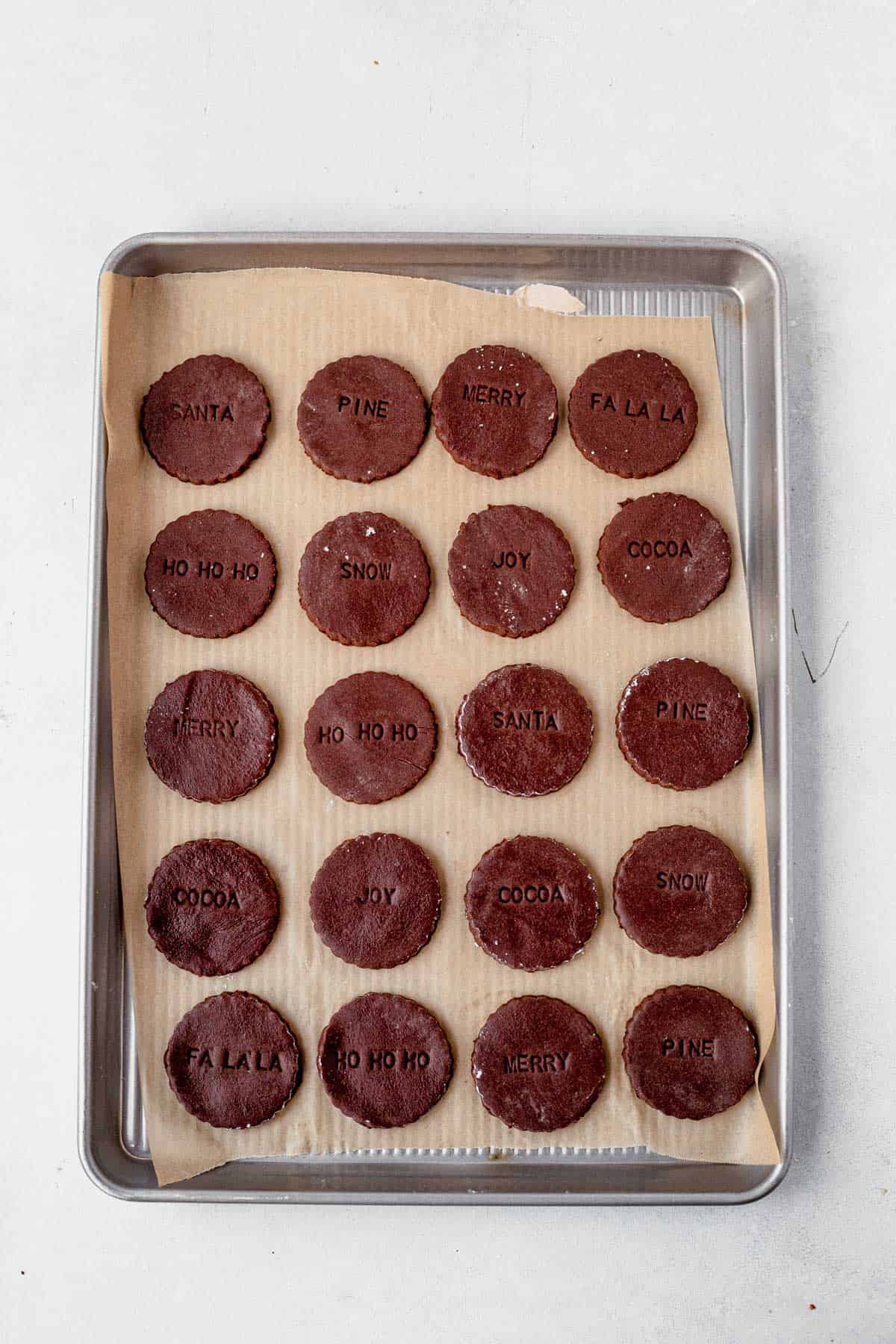 chocolate shortbread cookies chilling on a baking sheet