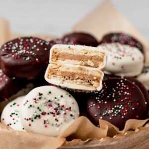 a bowl of ritz cookies with christmas sprinkles