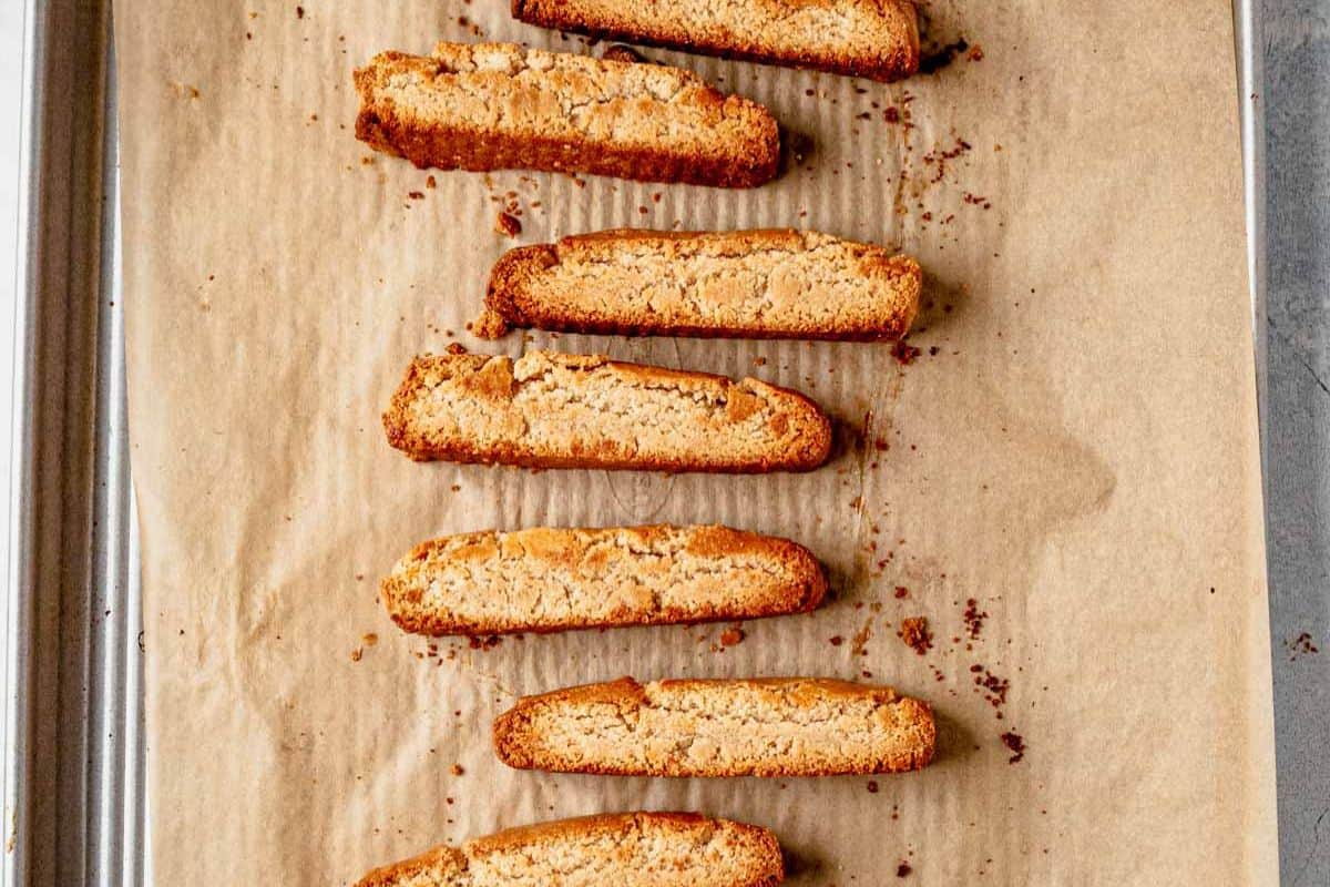 freshly baked gluten free biscotti on a parchment line cookie sheet